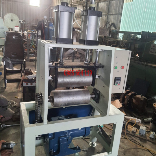máy ép vân gỗ bình dương