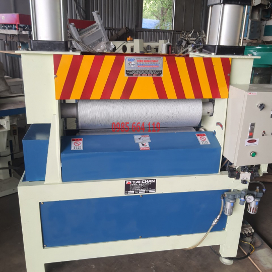 máy ép vân cước gỗ tự nhiên khổ 700mm